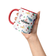 11oz_Kraken_Christmas_Mug_Lifestyle_Raised_Hand_Mockup.png