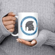 USS_ALexandria_FRG_15oz_Mug_15ozWhiteMugLifestyleLHChest_Mockup.png_15831461