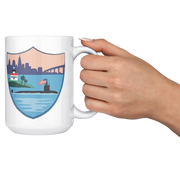 USS_ALexandria_FRG_15oz_Mug_15ozWhiteMugLifestyleRHCheers_Mockup.png_15831463