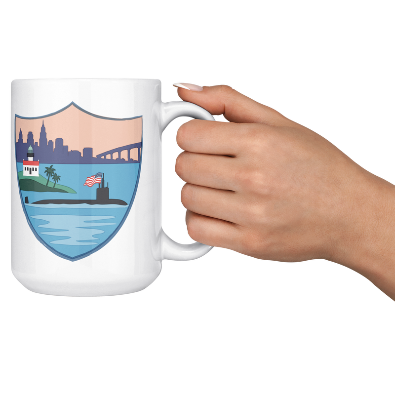 USS_ALexandria_FRG_15oz_Mug_15ozWhiteMugLifestyleRHCheers_Mockup.png_15831463