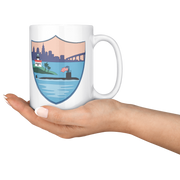USS_ALexandria_FRG_15oz_Mug_15ozWhiteMugLifestyleRHServing_Mockup.png_15831464